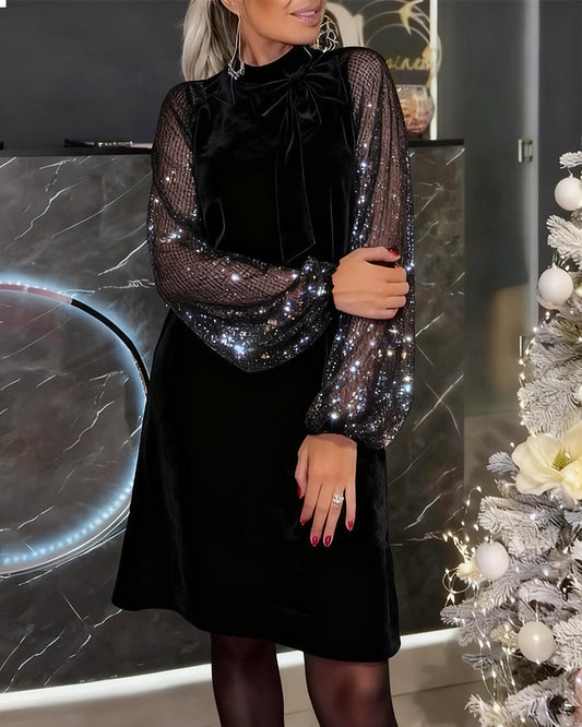 Elegancka sukienka z rękawami typu latarnia i patchworkiem