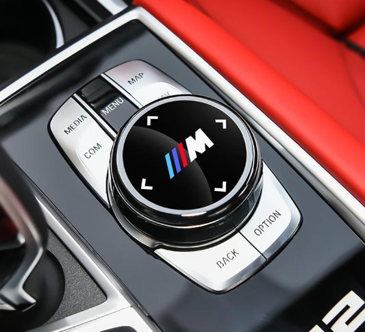 Dekorativna nalepka za multimedijski gumb pri BMW-ju