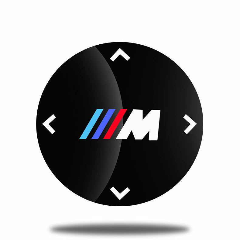 Dekorativna nalepka za multimedijski gumb pri BMW-ju