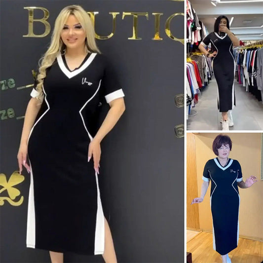 Modna damska sukienka o dopasowanym kroju w paski z dekoltem w kształcie litery V